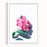 Abstract art print featuring swirling spring hues on a white framed canvas, suitable for bedroom or dining room decor.