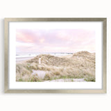 Textured abstract art print in silver frame, featuring dynamic swirls in warm summer tones, suited for bedroom decor.