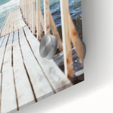 Large abstract wall art in vibrant orange and yellow tones on acrylic glass.