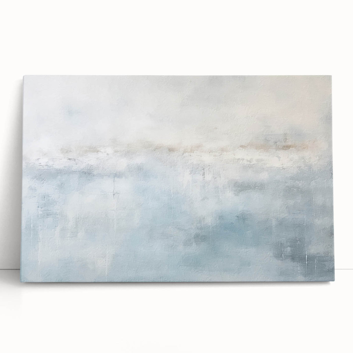 Abstract strokes wall art on a stretched canvas, showcasing vibrant colors of blue, orange, and gold, leaning against a neutral wall, perfect for modern decor.