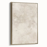 Framed canvas wall art featuring abstract strokes in gold and neutral tones, showcasing a contemporary design that enhances modern decor aesthetics.