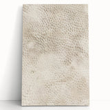 Abstract strokes wall art on stretched canvas showcasing vibrant blue, orange, and yellow hues, elegantly leaning against a modern interior wall, adding a contemporary touch to home decor.