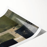 Abstract wall art print showcasing colorful strokes in vibrant hues of blue, orange, and yellow, rolled and ready for display, enhancing modern decor aesthetics.