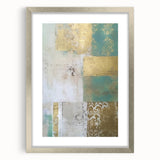 Abstract wall art featuring vibrant strokes in shades of blue, gold, and silver, set in a sleek silver frame with a white mat, ideal for modern home decor.