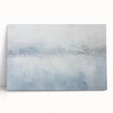 Abstract wall art featuring vibrant blue, orange, and yellow strokes on stretched canvas, leaning against a neutral wall, perfect for modern home decor.