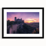 Elegant black-framed landscape artwork featuring a majestic castle set against a serene backdrop, complete with a white mat for a polished presentation. Ideal for home decor.