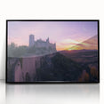 Framed acrylic artwork depicting a scenic landscape with a castle, featuring a sleek black frame that enhances its modern aesthetic, ideal for home decor.