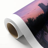 Rolled canvas showcasing a detailed landscape design of a majestic castle nestled among lush greenery, featuring vibrant colors and intricate textures, perfect for home decor.