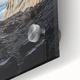 Close-up view of an acrylic glass art piece depicting vibrant landscapes and caves, showcasing intricate details and colors that enhance its visual appeal. Perfect for modern home decor.