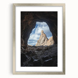 Framed landscape artwork depicting a serene cave scene, featuring a silver mat and elegant border, perfect for home decor or art enthusiasts.
