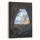 Framed canvas artwork showcasing a stunning landscape of caves in earthy tones, with a sleek black frame and side view highlighting its modern aesthetic. Ideal for enhancing interior decor.