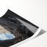Vibrant rolled print showcasing a stunning cave landscape with rich colors and intricate details, elegantly packaged for easy display and protection.