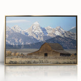 Framed acrylic artwork showcasing a stunning landscape of a barn, highlighted by elegant gold accents, perfect for enhancing home decor with rustic charm.