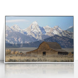 Framed acrylic artwork of a serene landscape featuring a rustic barn, with a white frame, showcasing vibrant colors and detailed textures, ideal for home decor.