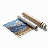Landscape barn rolled print showcasing a rustic red barn surrounded by lush green fields under a clear blue sky, elegantly packaged in a protective cardboard tube for easy transport.