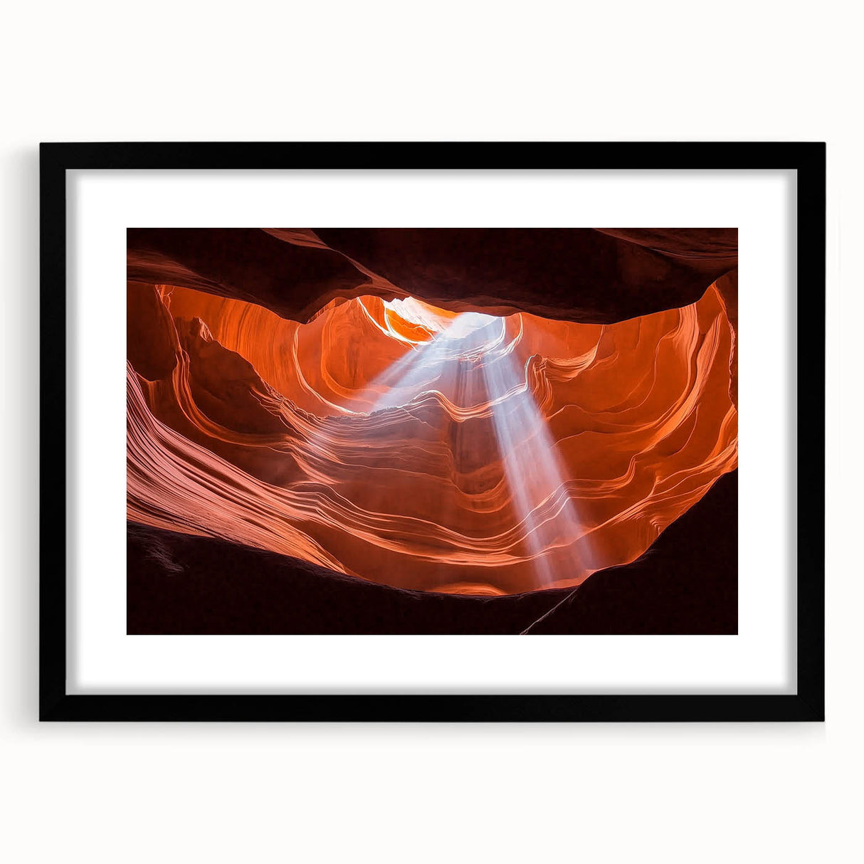 Black-framed landscape art print showcasing vibrant canyons, set against a white mat for a modern touch, perfect for enhancing home decor aesthetics.
