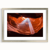 Silver-framed landscape art print showcasing a vibrant canyon scene with rich colors and intricate details, perfect for home decor or office enhancement.