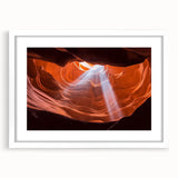 Framed landscape art print depicting vibrant canyons, featuring a white mat and sleek black frame, designed to enhance modern home décor. Perfect for adding color and depth to living spaces.