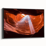 Framed canvas artwork depicting a vibrant landscape of canyons in rich earth tones, showcasing dramatic rock formations and contrasting sky, ideal for home decor.