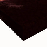 Close-up of a stretched canvas artwork showcasing a vibrant landscape of canyons, featuring rich earthy tones and intricate textural details, ideal for home decor.