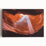 Stretched canvas artwork depicting a vibrant landscape of canyons under a blue sky, showcasing rich earthy tones and dramatic rock formations, ideal for home decor.