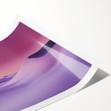 Desert-themed rolled canvas print showcasing vibrant orange and yellow hues of a sunset over sand dunes, elegantly packaged in a protective cardboard tube for easy display.