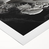 Art deco poster featuring geometric patterns in muted gold and black on rolled canvas.