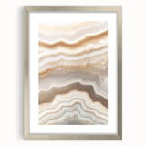 Textured abstract art print with swirling gray and white patterns, framed in silver, ideal for bedroom wall decor.