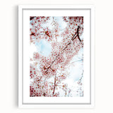 Abstract art print featuring swirling pastel colors on a white-framed canvas, ideal for dining room decor.