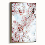 Framed canvas featuring a vintage-style landscape painting with spring theme in muted gold and black tones.