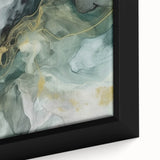 Close-up of a framed canvas wall art piece showcasing vibrant abstract strokes in shades of blue, orange, and yellow, perfect for modern home decor.