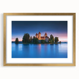 Elegant gold-framed landscape artwork featuring a serene castle scene with a mat, perfect for home decor. Ideal for adding a touch of sophistication to any room.