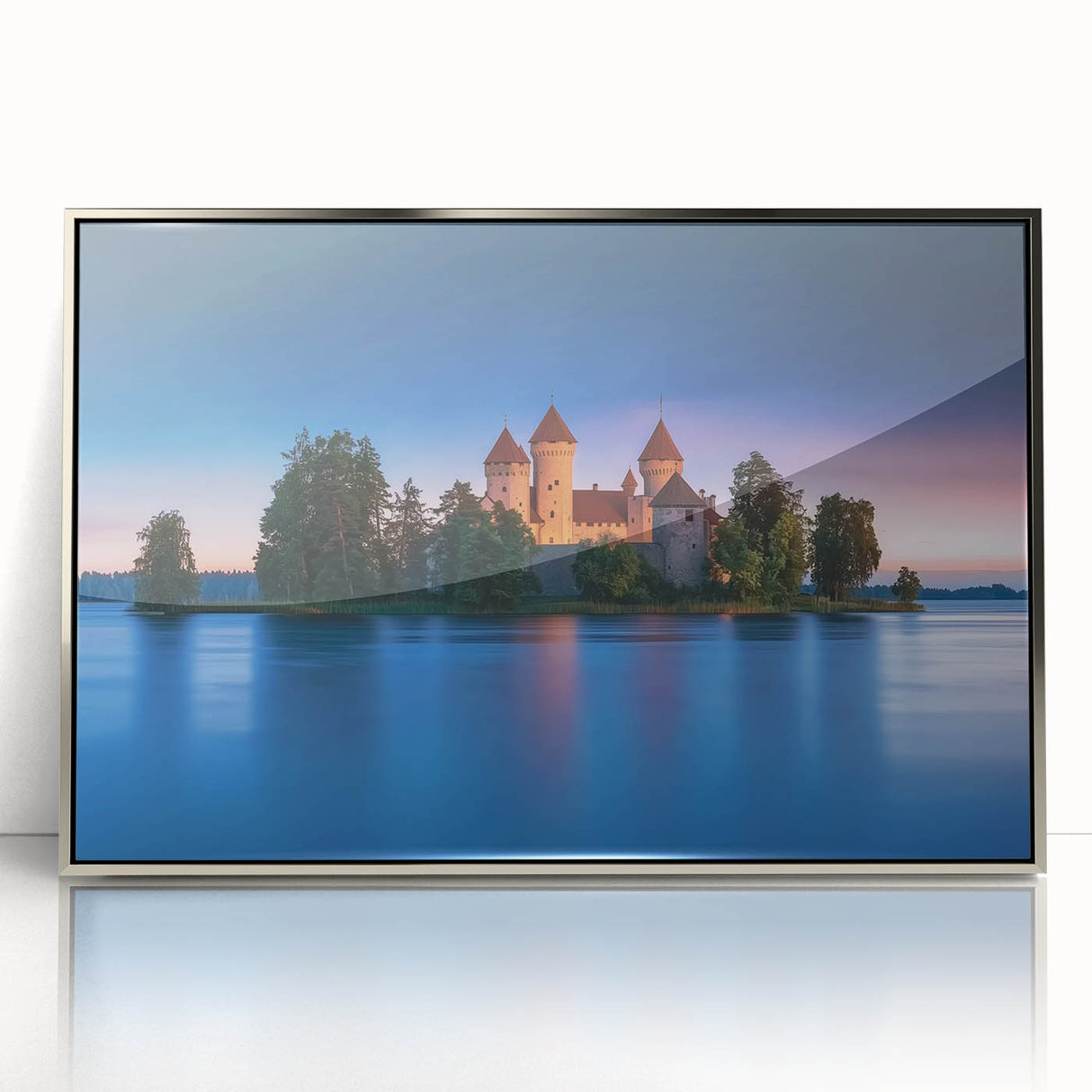 Framed acrylic artwork of a picturesque landscape featuring a majestic castle, elegantly displayed with a silver border, perfect for home decor enhancement.
