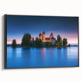 Framed canvas artwork showcasing a stunning landscape of a majestic castle, set against a vibrant blue sky. The black frame adds a modern touch, perfect for home decor.