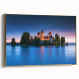 Framed canvas artwork of a majestic castle landscape, showcasing intricate details with a gold frame. Perfect for enhancing home decor with an elegant touch.