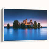 Framed canvas artwork depicting a picturesque castle landscape, showcasing vibrant colors and intricate details, displayed against a white backdrop for a modern aesthetic.