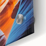 Close-up of a vibrant acrylic glass artwork depicting colorful landscapes and caves, showcasing intricate details and textures, perfect for modern decor.