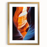 Framed landscape artwork featuring a serene cave scene, elegantly presented with a gold mat. Ideal for enhancing home decor with natural beauty.