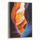 Framed canvas artwork showcasing a stunning landscape scene with caves, featuring elegant gold accents and a side view, ideal for modern home decor.