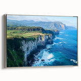 Framed canvas artwork showcasing a stunning coastal landscape with dramatic cliffs, silver frame, and vibrant colors, perfect for enhancing home decor.