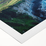 Stunning rolled canvas artwork depicting vibrant coastal cliffs at sunset, showcasing rich colors of orange, purple, and blue hues, ideal for home decor.