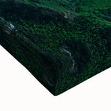 Close-up of a stretched canvas artwork showcasing dramatic cliffs and vibrant landscapes in rich colors, ideal for enhancing modern home decor and art collections.