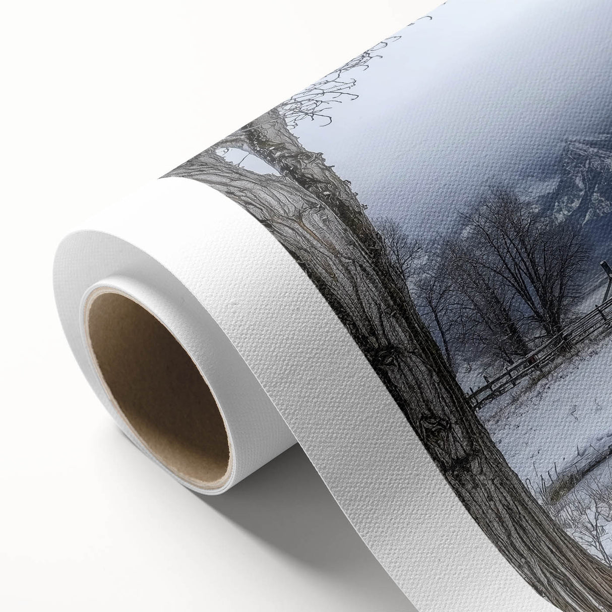 Rolled canvas showcasing a vibrant landscape design of a red barn surrounded by lush greenery, elegantly packaged in a durable cardboard tube for safe shipping.
