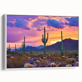 Framed canvas artwork depicting a serene desert landscape with warm hues of orange and beige, showcasing a white frame for modern decor enhancement. Ideal for home or office settings.