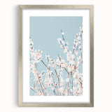 Textured abstract art print with soft green and pink hues on a silver-framed canvas, suitable for bedroom decor.