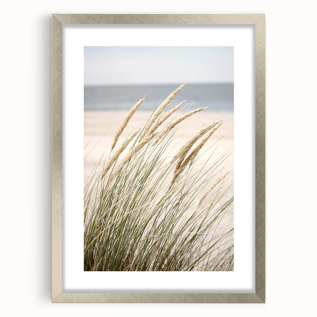 Textured abstract art print in silver frame, featuring dynamic swirls in warm hues, ideal for bedroom ambiance.