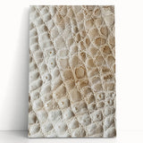 Abstract wall art featuring vibrant strokes in shades of blue, orange, and gold on a stretched canvas, leaning against a neutral wall, ideal for modern decor.