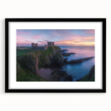 Framed landscape artwork depicting a serene castle scene, featuring a black mat and sleek frame, ideal for enhancing home decor with elegance and charm.
