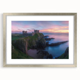Elegant silver-framed landscape artwork depicting a serene castle scene, surrounded by a soft mat, showcasing intricate details and vibrant colors. Perfect for home decor or gallery display, adding a touch of sophistication to any space.