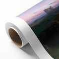 Rolled canvas artwork showcasing a picturesque landscape of a majestic castle surrounded by lush greenery and a vibrant sky, elegantly packaged in a protective cardboard tube. Perfect for home decor enthusiasts seeking to enhance their living space with charming scenery.